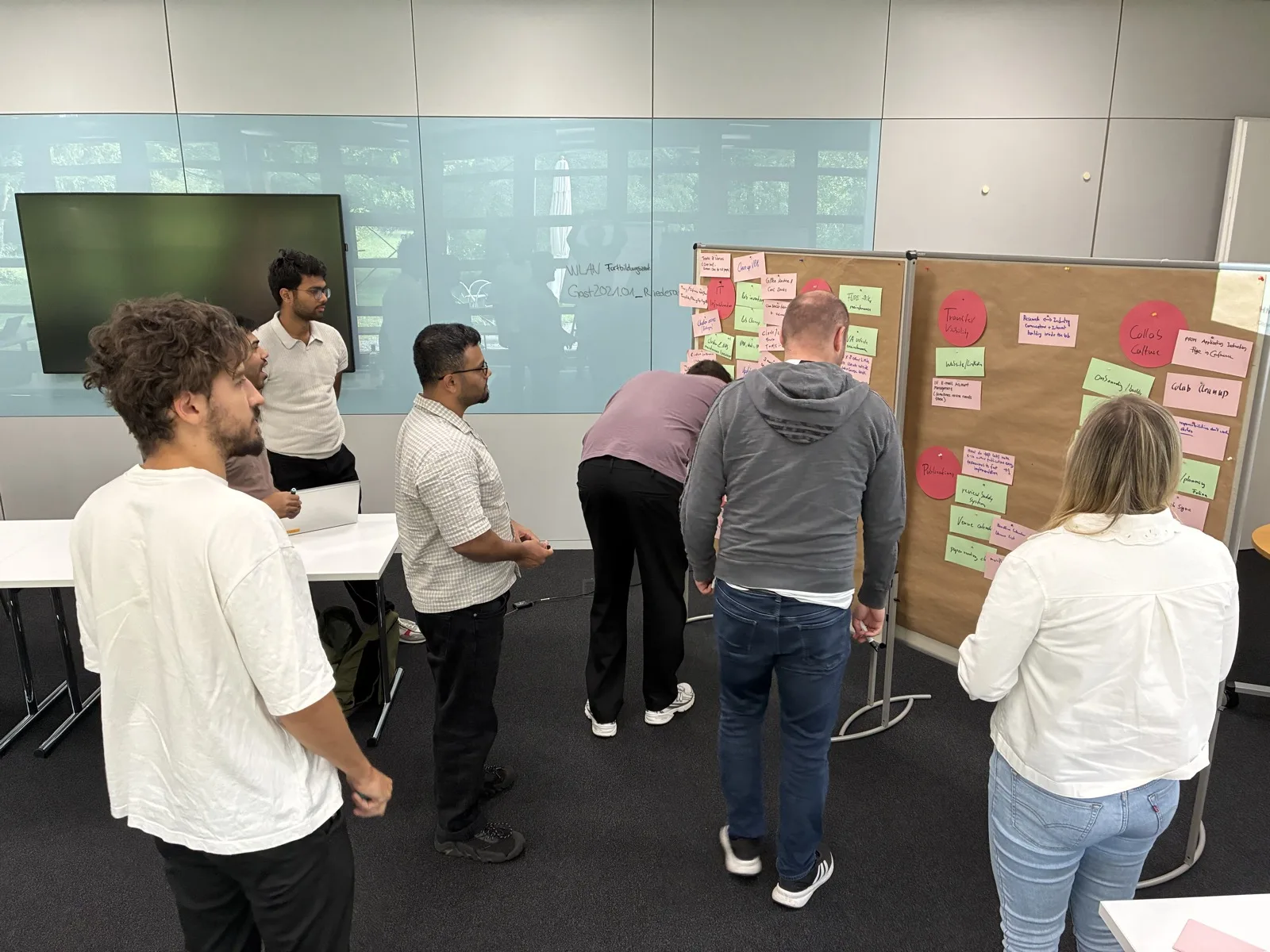 Lab members in front of the planning boards